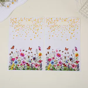 Pair of white gift bags featuring wildflower butterfly prints and gold glitter dots