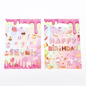 Pink candy-themed birthday party gift bags with dessert illustrations