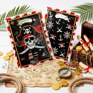 Detail view of pirate themed party gift bags with skull and ship designs on treasure map.