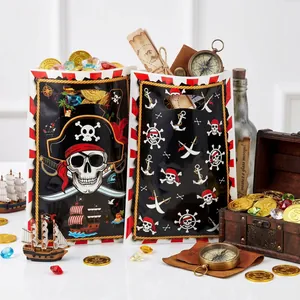Detailed shot of two pirate-themed plastic gift bags with skull and anchor prints