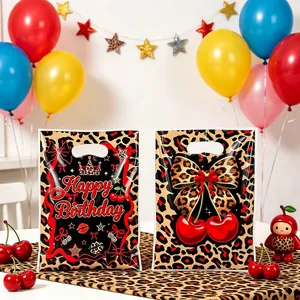 Leopard print cherry birthday gift bags for party favors shown in festive setting