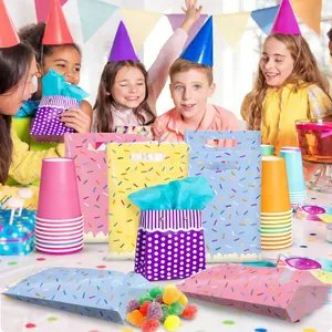 Assorted colorful sprinkle pattern party gift bags for kids' birthday favor treats and candy