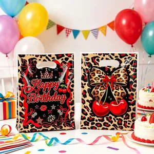 Cheetah print birthday gift bags with cherry and bow patterns in a party setting