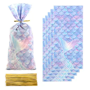 Iridescent mermaid scale pattern OPP candy bags with golden twist ties for gift packaging