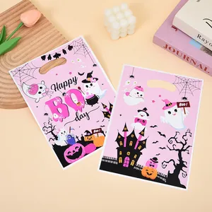 Pink Halloween ghost gift bag with Happy Boo Day print for party favors and candy.