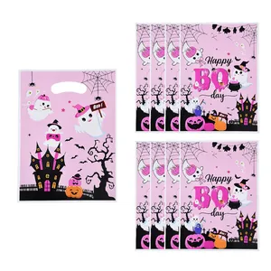 Set of pink Halloween gift bags featuring cute ghost and castle prints for party treats