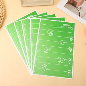 Green American football field themed plastic gift bags for sports themed party favors