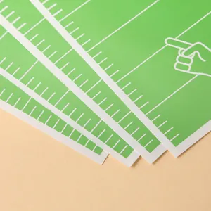 Set of green American football field theme paper gift bags for sports theme parties