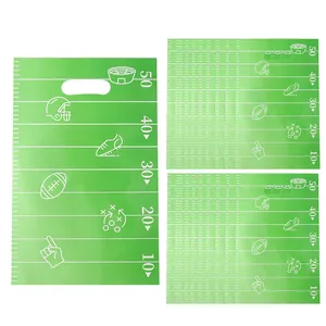 Green football themed plastic gift bags for sports parties with field yard numbers