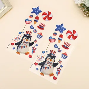 Independence Day themed stickers featuring American flag patterns and cartoon penguins