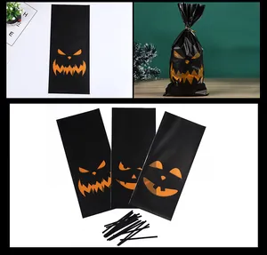 Detailed view of black Halloween pumpkin face OPP treat bags with matching twist ties