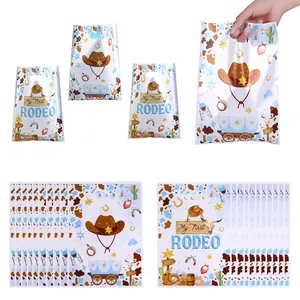 Cowboy theme pearl film gift bags with 'My First Rodeo' print and handles for party favors