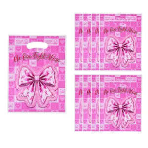 Pink bow print gift bag with No One Fight Alone slogan, pearlescent film party packaging