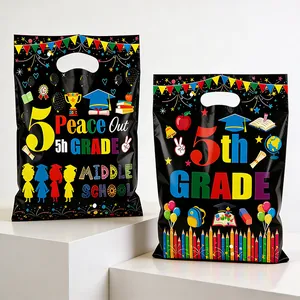 Two black graduation party gift bags featuring colorful 5th grade prints and handles