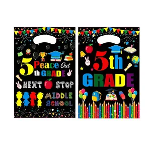 Graduation party gift bags featuring 5th Grade Peace Out design and school motifs