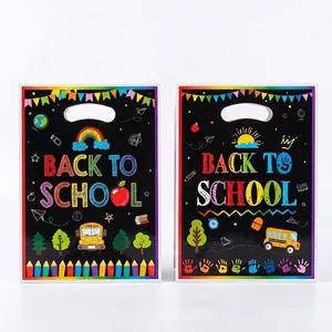 Front and back view of black chalkboard style back to school gift bags with handles