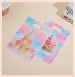 Pink watercolor gift bags with crown illustration and handle cutout detail