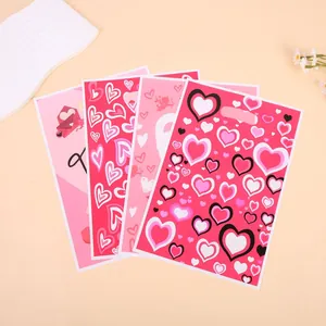 Lote de bolsas de regalo con estampado de corazones para San Valentín y asa, 4 modelos.