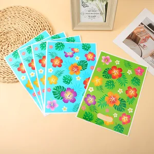 Tropical floral print party favor bags with hibiscus and monstera leaf patterns