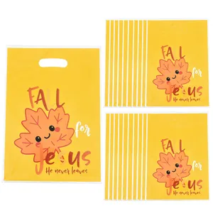 Set of yellow maple leaf print gift bags with Fall for Jesus theme for parties