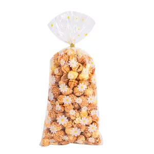 Fresh daisy print clear OPP packaging bag for candy and snacks with gold twist tie