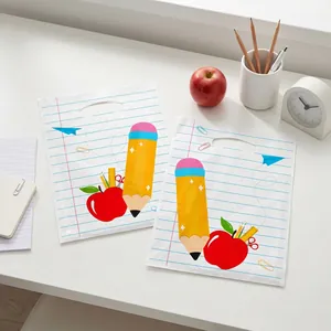 Geschenktüten zum Schulanfang mit Bleistift, Apfel und Notizbuchlinien-Design