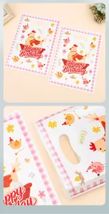 Detail view of cartoon chicken birthday gift bags showing the reinforced punch-out handle