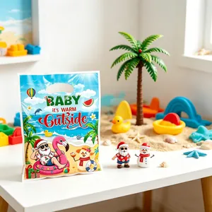 Detail of a Summer Christmas themed plastic gift bag with tropical Santa beach illustration