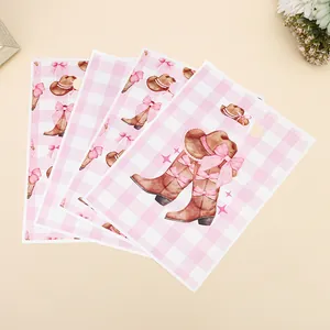 Pink plaid party gift bags featuring cute cowboy boot illustrations, size 18x25cm