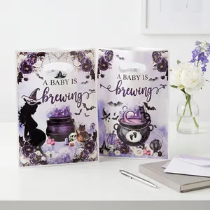 Purple witch baby shower gift bags with 'A Baby is Brewing' text for Halloween party