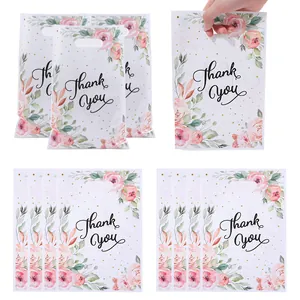 Floral plastic gift bags with Thank You print for holiday party favors and candy packing