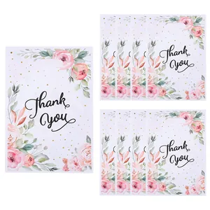 Elegant floral Thank You gift bags with pink roses and gold dots for holiday parties