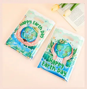 Detailed view of Happy Earth Day themed gift bags for snacks and candies