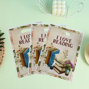 Three vintage I Love Reading printed gift bags with classic books and floral illustrations