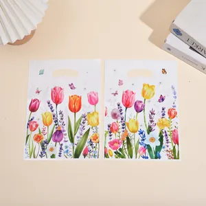 Pearlescent gift bags featuring elegant tulip and wildflower floral prints for parties.