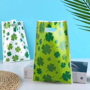 Durable St. Patrick's Day gift bags with green four-leaf clover pattern for party favors
