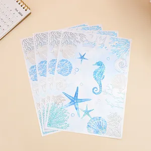 Watercolor ocean sea life gift bags with seahorse and starfish for beach party favors