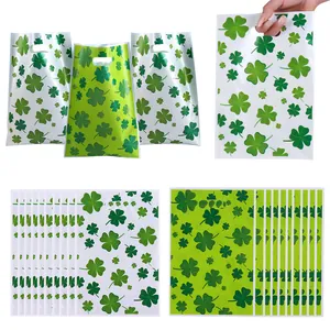 St. Patrick's Day plastic gift bags with green four-leaf clover patterns for party favors