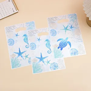 Watercolor ocean themed plastic gift bags featuring sea turtle and starfish designs