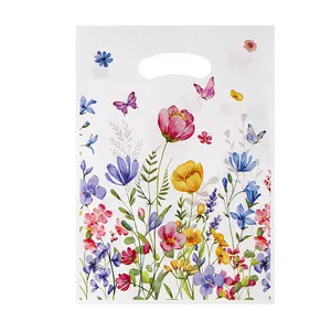 Bolsa de regalo de plástico blanco con estampado floral de colores y asa para caramelos