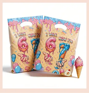 Detail view of colorful birthday party gift bags with cute ice cream and donut prints