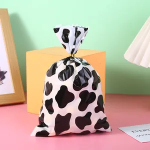 Sac d'emballage alimentaire OPP à motif de vache avec attache dorée pour les bonbons