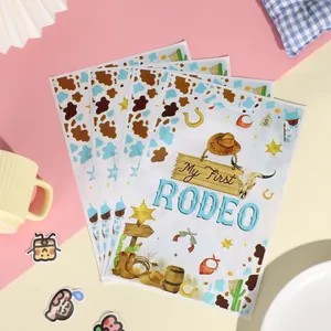 Geschenktüten zum Thema My First Rodeo mit Cowboyhut- und Kaktusdrucken für Partyartikel