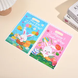 Leuke Pasen cadeauzakjes met cartoon konijn in roze en blauw voor feestjes