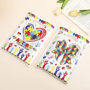 Bolsas de regalo de plástico para el autismo con patrones de corazón y lazo de rompecabezas