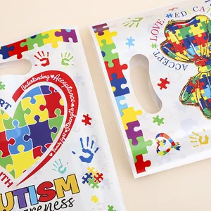 Bolsas de regalo Autismo blancas con patrones de corazones y mariposas de rompecabezas