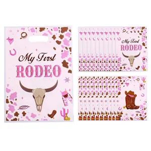 Pinke Western-Cowboy-Party-Geschenktüten mit „My First Rodeo“-Büffelschädel-Druck
