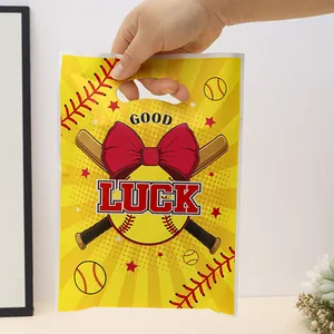Softball themed party gift bag with large red bow and Good Luck printed design