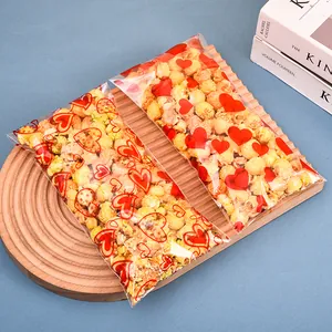 Sachets de bonbons autocollants OPP avec imprimé cœurs pour friandises et popcorn