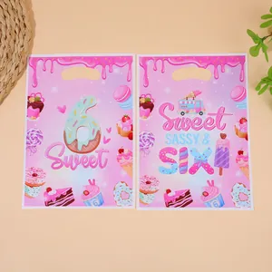 Pair of pink 6th birthday party gift bags with sweet donut and dessert print designs